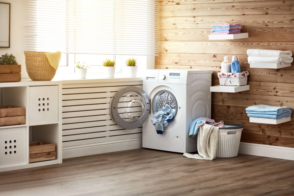 Our Top 3 Laundry Room Flooring Options, Sliding Washing Machine On Vinyl Floor