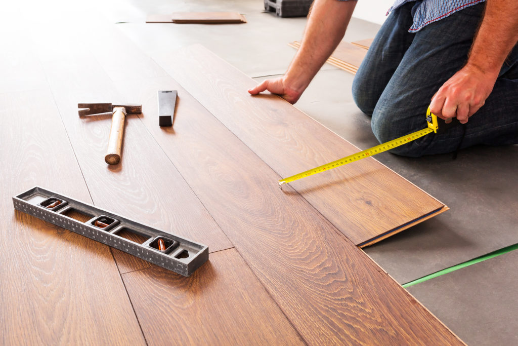 Installing engineered wood flooring with click-together system