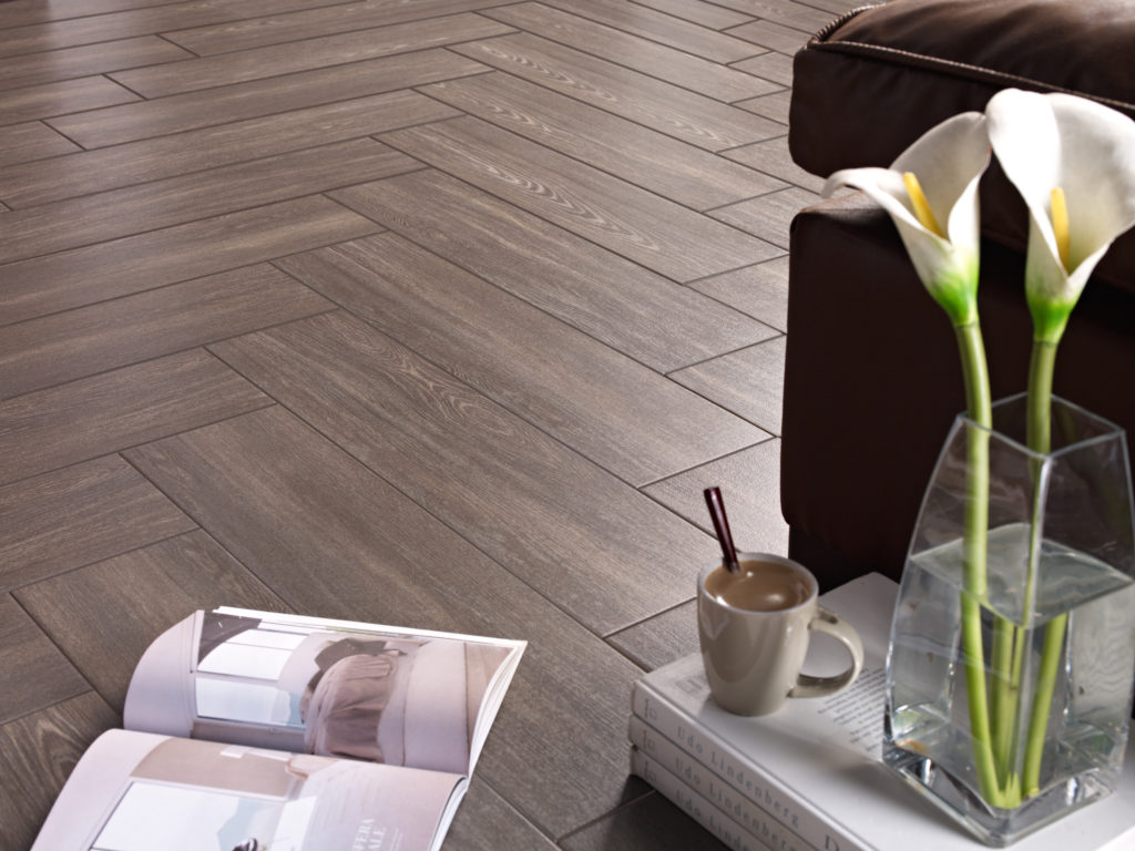 Wood look tile floor in herringbone parquet