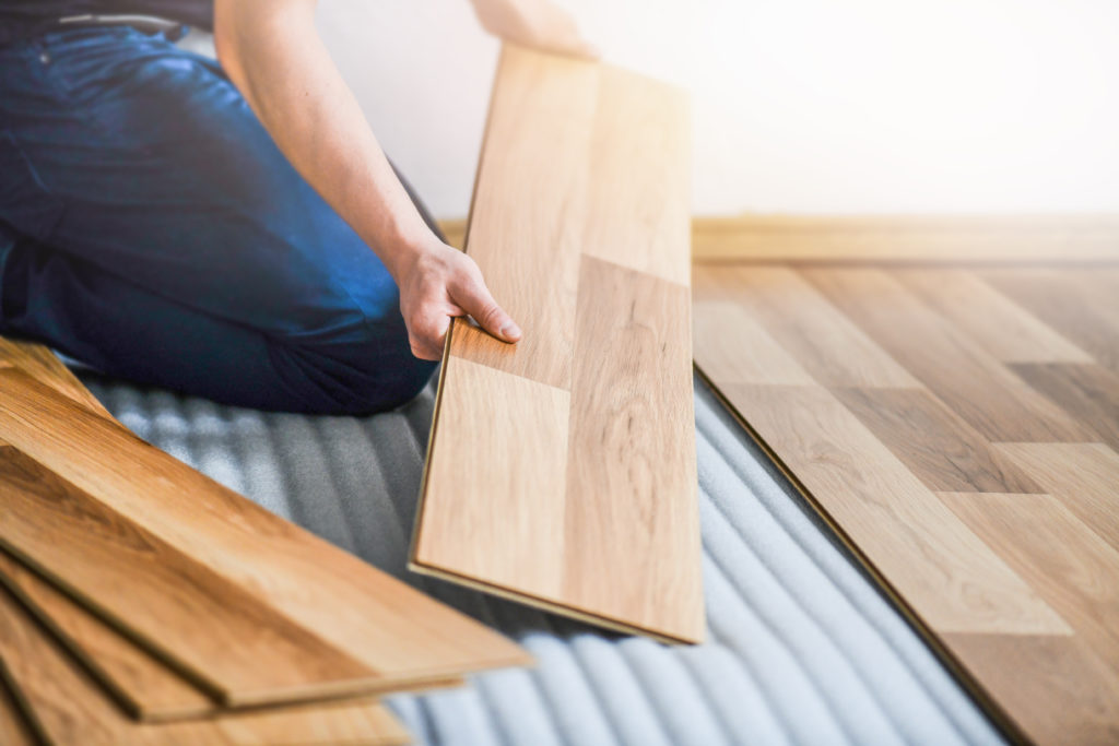 Laminate vs. Hardwood Floor Installation of Planks