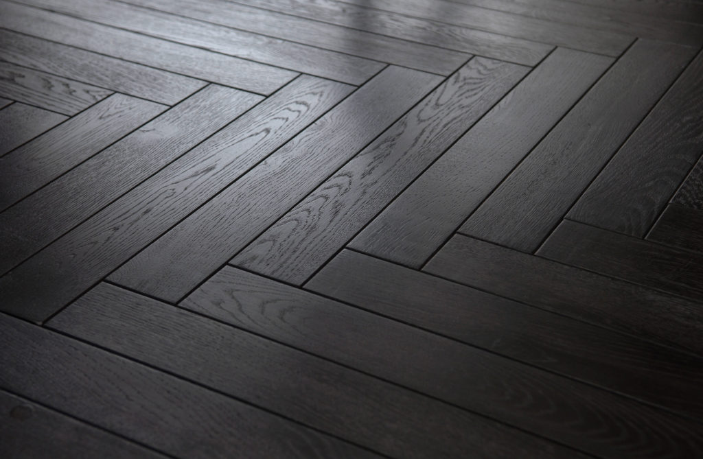 Herringbone parquet wood floor dark