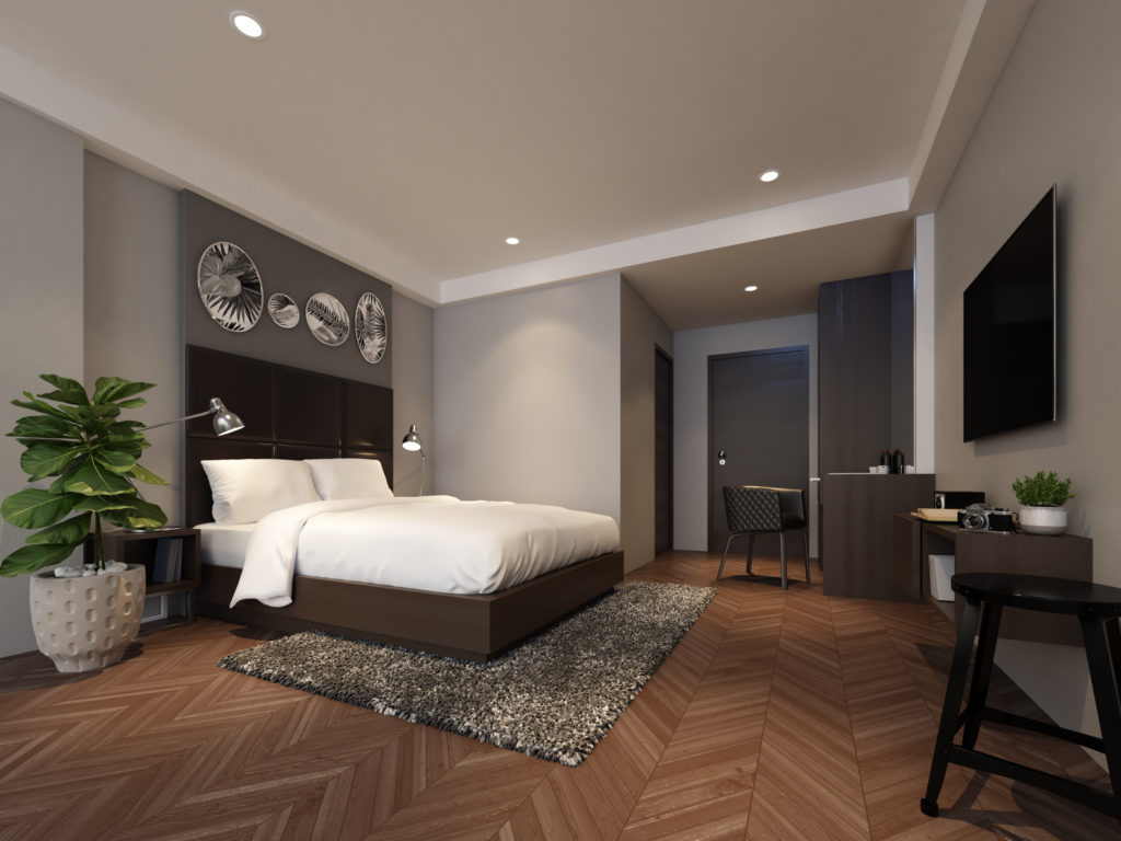 Chevron parquet wood floor patterns in a modern bedroom