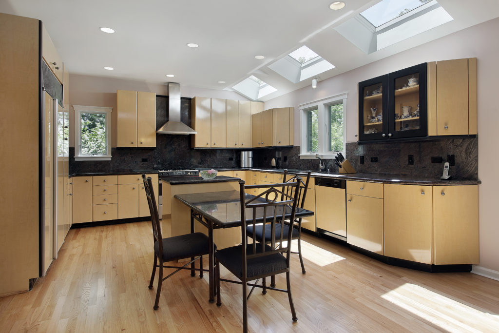 Modern kitchen with light wood floor