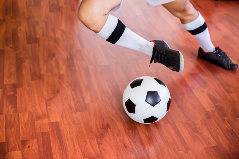 Revwood featured image of soccer on a wood floor