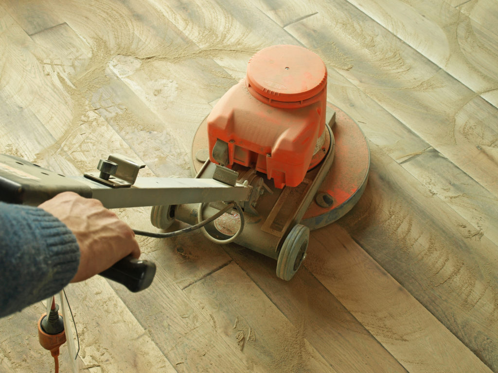 Sanding down mixed-width wood planks
