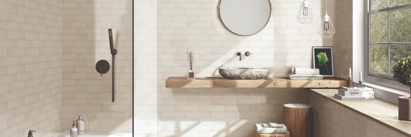 cream bathroom tile with ivory bathub