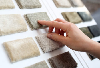 Best Carpet Brands Featured Image of Woman Selecting Samples