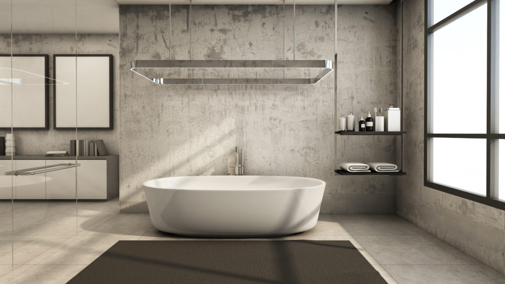 Modern bathroom with light concrete flooring and walls